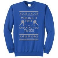 Making A Fist Checking You Twice Funny Christmas Hockey Pun Gift Tall Sweatshirt