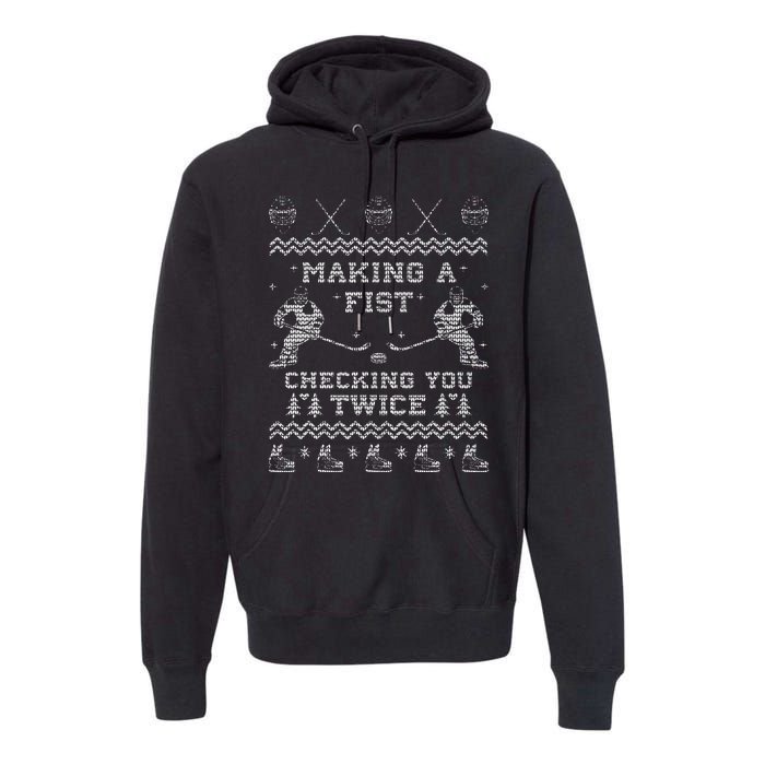 Making a fist checking you twice Hockey Xmas Gifts Premium Hoodie