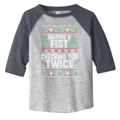 Making A Fist Checking You Twice Hockey Player Christmas Cool Gift Toddler Fine Jersey T-Shirt