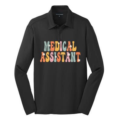 Medical Assistant Week Groovy Appreciation Day Silk Touch Performance Long Sleeve Polo