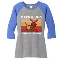 Merry Christmas Dachshund Dog Through The Snow Cool Gift Women's Tri-Blend 3/4-Sleeve Raglan Shirt