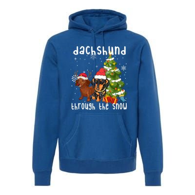 Merry Christmas Dachshund Dog Through The Snow Gift Premium Hoodie