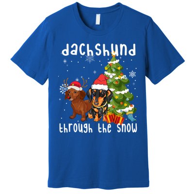 Merry Christmas Dachshund Dog Through The Snow Gift Premium T-Shirt