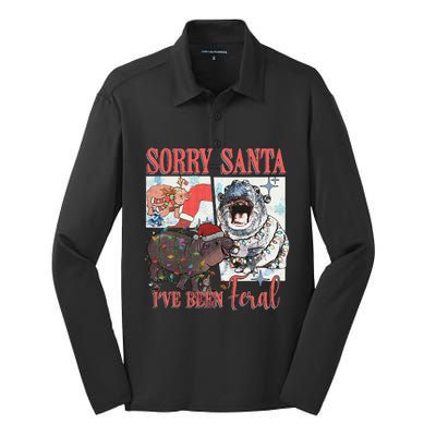 Moo Deng Christmas Santa Hat Sorry Santa IVe Been Feral Silk Touch Performance Long Sleeve Polo