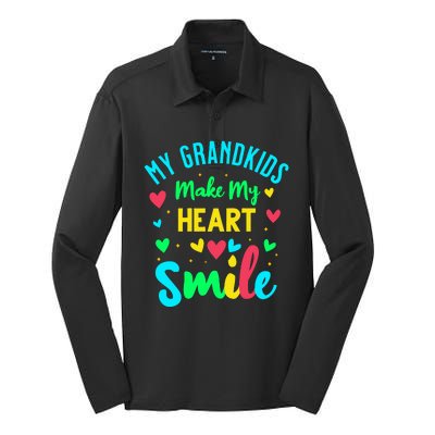 My Grandkids Make My Heart Smile Silk Touch Performance Long Sleeve Polo