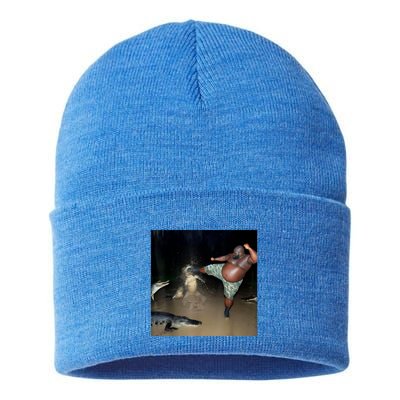 Man Kicking Alligator In Swamp Funny Oddly Specific Meme Sustainable Knit Beanie