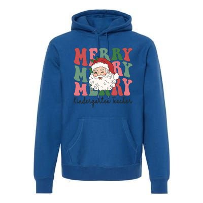 Merry Kindergarten Teacher Retro Groovy Santa Face Christmas Funny Gift Premium Hoodie