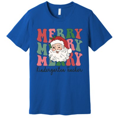 Merry Kindergarten Teacher Retro Groovy Santa Face Christmas Funny Gift Premium T-Shirt