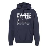 Music Literacy Matters I Like To Eat Puppies Funny Design Premium Hoodie