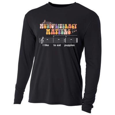 Music Literacy Matters I Like To Eat Puppies Funny Cooling Performance Long Sleeve Crew