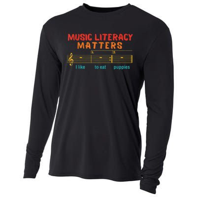 Music Literacy Matters I Like To Eat Puppies Funny Cooling Performance Long Sleeve Crew