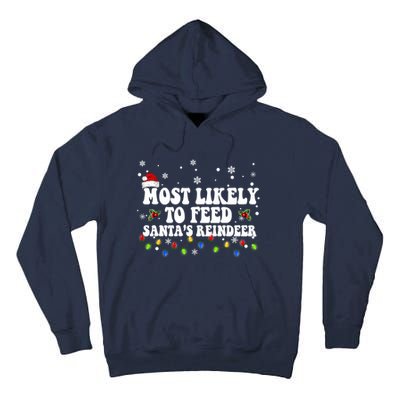 Most Likely To Feed Santa's Reindeer Christmas Believe Santa Tall Hoodie