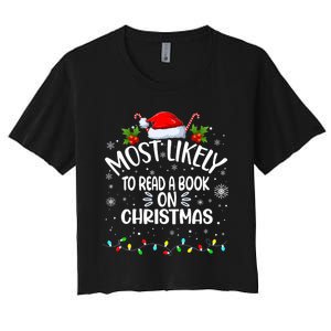 Most Likely To Read A Book On Christmas Women's Crop Top Tee