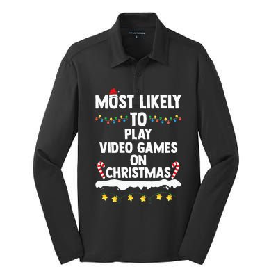 Most Likely To Play Video Games On Christmas Funny Gaming Silk Touch Performance Long Sleeve Polo