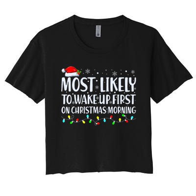 Most Likely To Wake Up First On Christmas Morning Xmas Light Women's Crop Top Tee