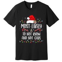 Most Likely To Not Know And Not Care Christmas Xmas Holiday Premium T-Shirt