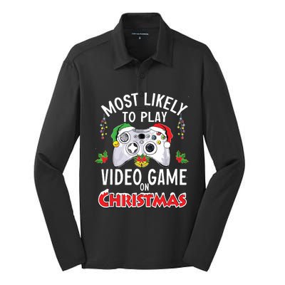 Most Likely To Play Video Games On Christmas Xmas Lights Silk Touch Performance Long Sleeve Polo