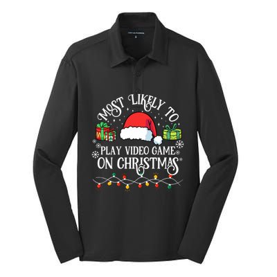 Most Likely To Play Videogame On Christmas Funny Xmas Pajama Funny Gift Silk Touch Performance Long Sleeve Polo