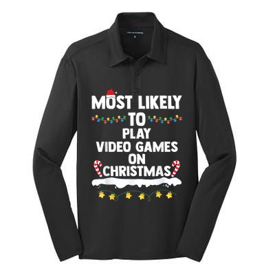 Most Likely To Play Video Games On Christmas Gamer Lovers Silk Touch Performance Long Sleeve Polo