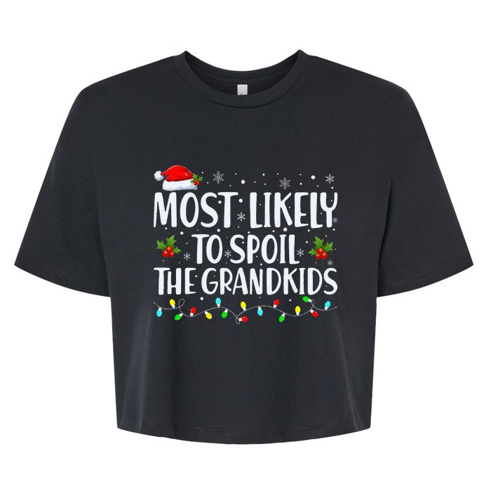 Most Likely To Spoil The Grand Funny Christmas Grandma Bella+Canvas Jersey Crop Tee