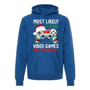 Most Likely To Play Video Games On Christmas Funny Gamer  Premium Hoodie