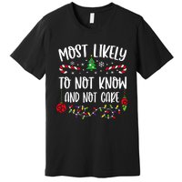 Most Likely To Not Know And Not Care Xmas Family Christmas Premium T-Shirt