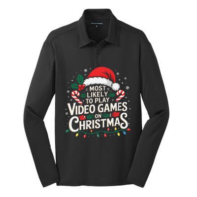 Most Likely To Play Video Games On Christmas Fun Gamer Xmas Silk Touch Performance Long Sleeve Polo