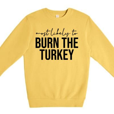 Most Likely To Burn The Turkey Funny Thanksgiving Premium Crewneck Sweatshirt