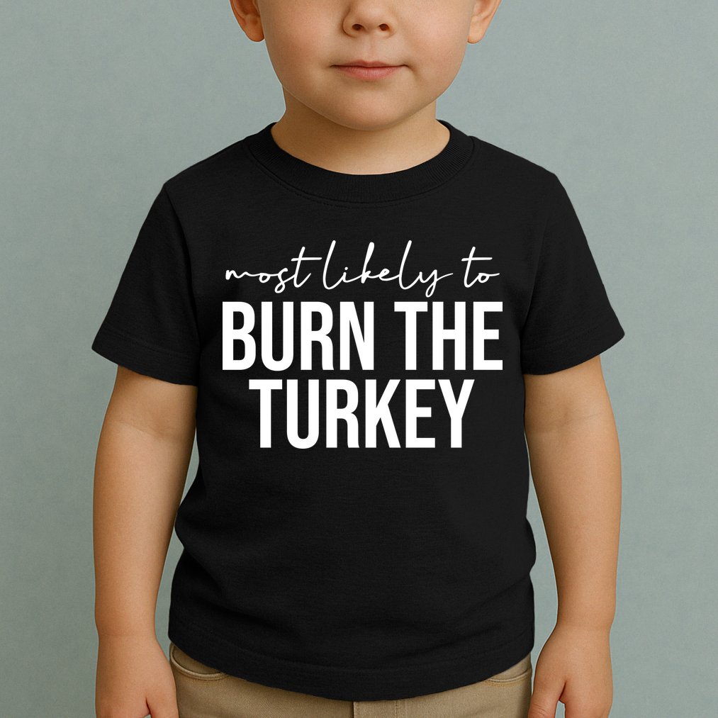 Most Likely To Burn The Turkey Funny Thanksgiving Toddler T-Shirt