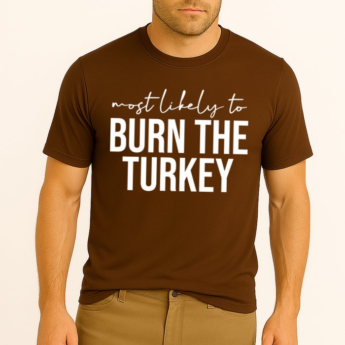 Most Likely To Burn The Turkey Funny Thanksgiving Cooling Performance Crew T-Shirt