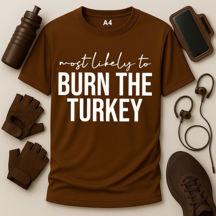 Most Likely To Burn The Turkey Funny Thanksgiving Cooling Performance Crew T-Shirt