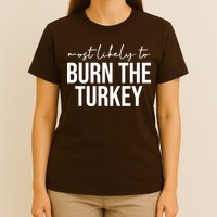 Most Likely To Burn The Turkey Funny Thanksgiving T-Shirt