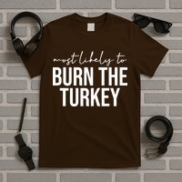 Most Likely To Burn The Turkey Funny Thanksgiving T-Shirt