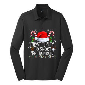 Most Likely To Shoot The Reindeer Matching Family Gift Silk Touch Performance Long Sleeve Polo