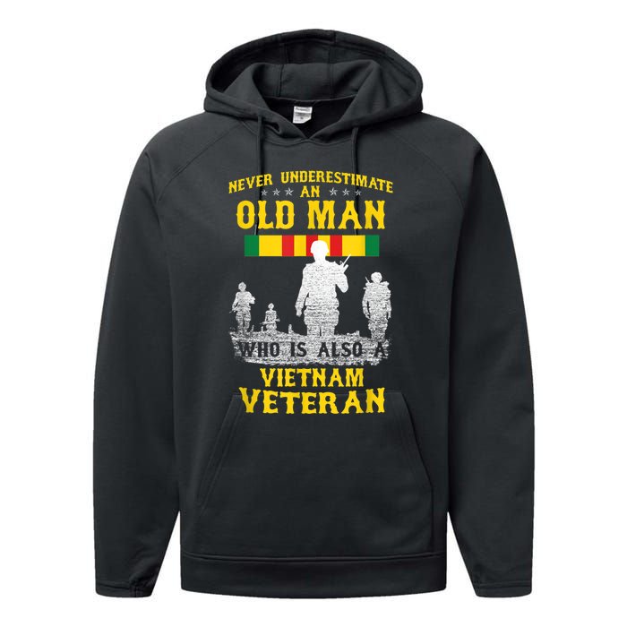 Mens Never Underestimate An OLD MAN Vietnam Veteran Gift Performance Fleece Hoodie