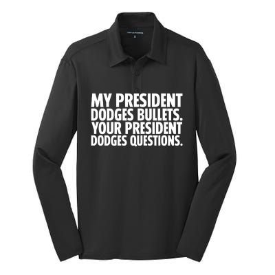 My President Dodges Bullets Your President Dodges Silk Touch Performance Long Sleeve Polo