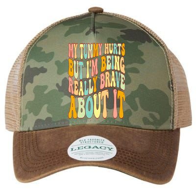 My Tummy Hurts But I'm Being Really Brave About It Groovy Legacy Tie Dye Trucker Hat