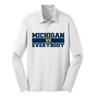 Michigan Versus Everybody Football Sports Fan Silk Touch Performance Long Sleeve Polo