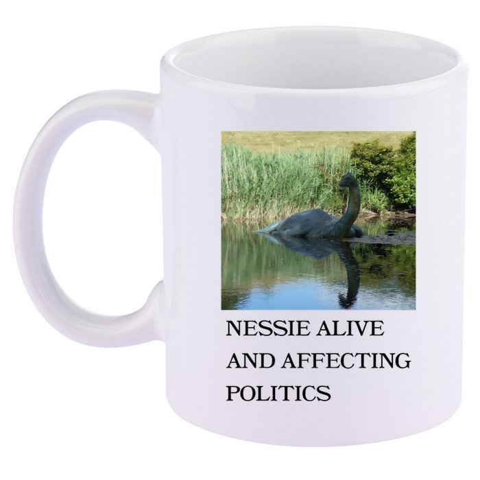 Nessie Alive And Affecting Politics 11oz C Handle Ceramic Mug