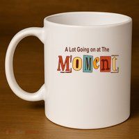 NOT A LOT GOING ON AT THE MOMENT 11oz C Handle Ceramic Mug