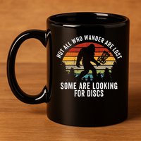 Not All Who Wander Are Lost Disc Golf Bigfoot Sasquatch 11oz C Handle Ceramic Mug