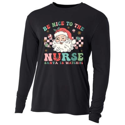 Nurse Christmas Be Nice To The Nurse Santa Is Watching Cooling Performance Long Sleeve Crew