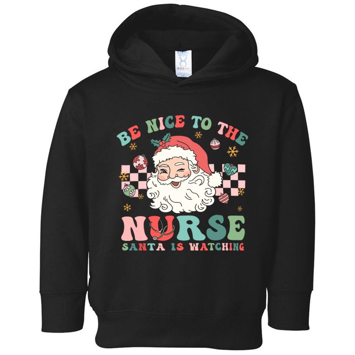 Nurse Christmas Be Nice To The Nurse Santa Is Watching Toddler Hoodie