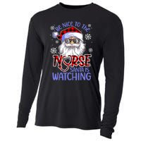 Nurse Christmas Be Nice To The Nurse Santa Is Watching Cooling Performance Long Sleeve Crew