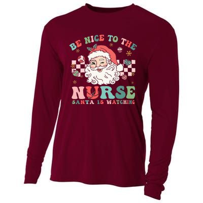 Nurse Christmas Be Nice To The Nurse Santa Is Watching Cooling Performance Long Sleeve Crew