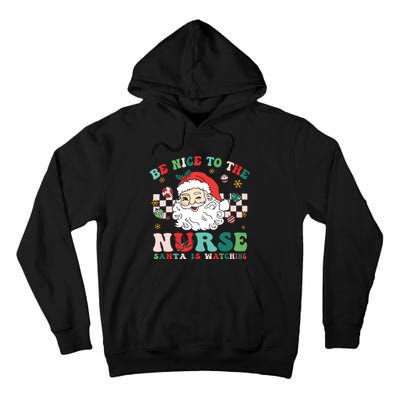 Nurse Christmas Shirts Be Nice To The Nurse Santa Is Watching Tall Hoodie