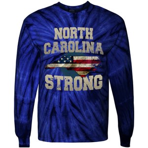 North Carolina Strong With Nc State And Usa Flag Overlay Tie-Dye Long Sleeve Shirt