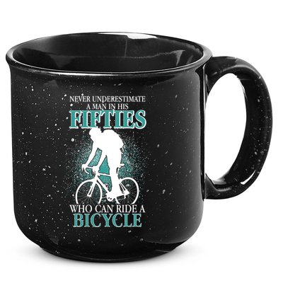 Never Underestimate A Man In His Fifties Who Can Ride A Bicycle 15oz Campfire Ceramic Mug