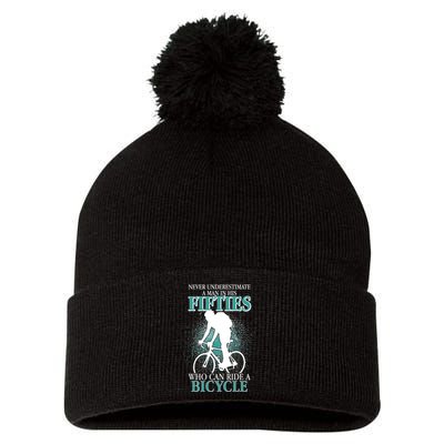 Never Underestimate A Man In His Fifties Who Can Ride A Bicycle Pom Pom 12in Knit Beanie