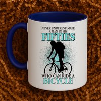 Never Underestimate A Man In His Fifties Who Can Ride A Bicycle Mug